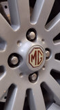 DTC100630(CAC). MG Centre Caps Set of 4 (54mm) Silver (Please read description for fitment information)
